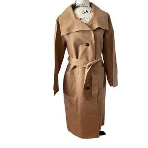 The author. brown classics trench coat